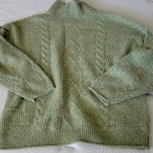 Green turtle neck sweater